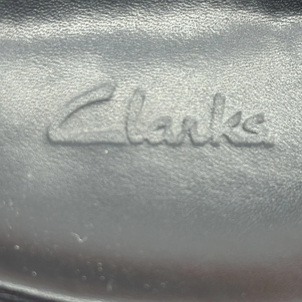 Clarks Black Leather Slide Sandals with Silver Buckle